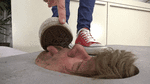 Face in the floor is used as a doormat